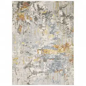 Photo of Grey Blue Beige Gold And Rust Abstract Power Loom Stain Resistant Area Rug