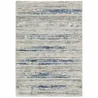 Photo of Grey Blue Light Blue Ivory And Brown Abstract Power Loom Stain Resistant Runner Rug