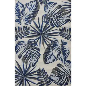 Photo of Grey Blue Machine Woven Oversized Tropical Leaves Indoor Area Rug