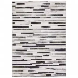 Photo of Grey Charcoal And Beige Geometric Power Loom Stain Resistant Area Rug