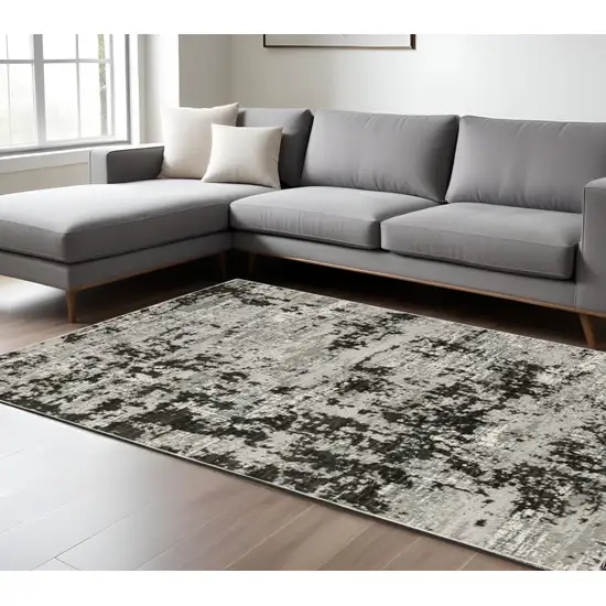 Gray and Ivory Abstract Power Loom Area Rug Photo 1