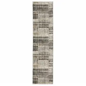 Photo of Grey Charcoal Ivory Tan Brown And Beige Geometric Power Loom Stain Resistant Runner Rug