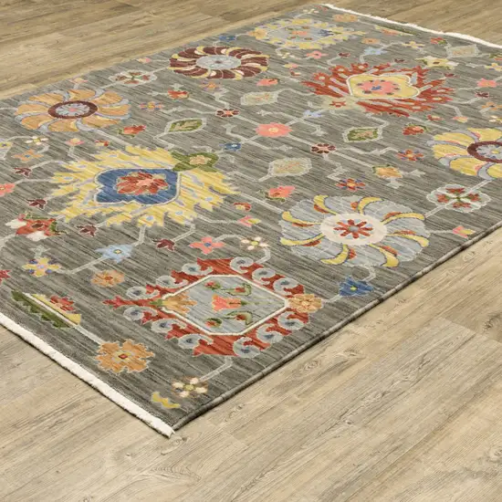 Grey Charcoal Yellow Blue Rust Red Pink Green And Ivory Oriental Power Loom Stain Resistant Area Rug With Fringe Photo 6