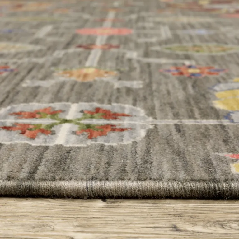 Grey Charcoal Yellow Blue Rust Red Pink Green And Ivory Oriental Power Loom Stain Resistant Area Rug With Fringe Photo 5