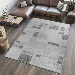 Photo of Grey Geometric Area Rug