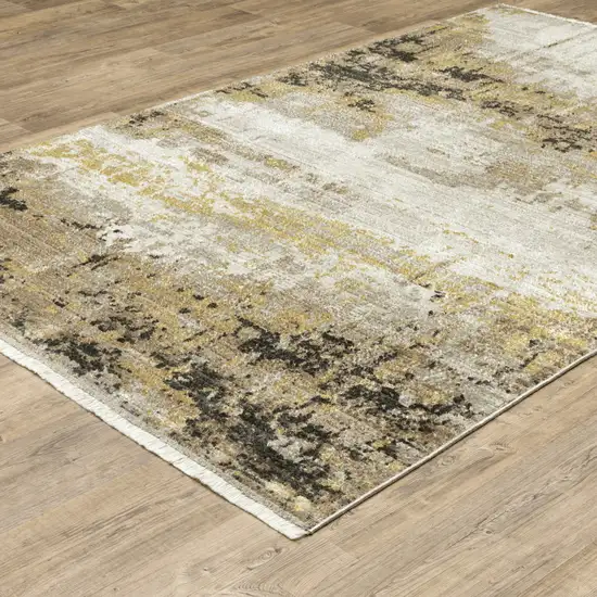 Grey Gold Black Charcoal And Beige Abstract Power Loom Stain Resistant Area Rug With Fringe Photo 5