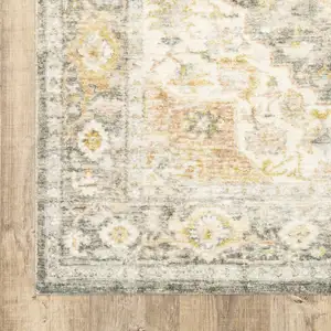 Photo of Grey Gold Orange And Ivory Oriental Power Loom Stain Resistant Area Rug