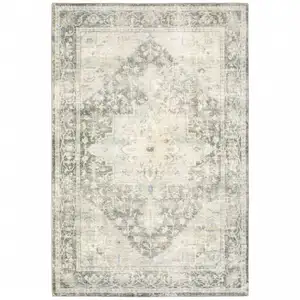 Photo of Grey Ivory And Blue Oriental Power Loom Stain Resistant Area Rug