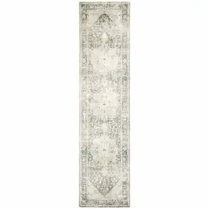 Photo of Grey Ivory And Blue Oriental Power Loom Stain Resistant Runner Rug