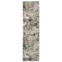 Photo of Grey Ivory Beige Charcoal Black Tan And Brown Abstract Power Loom Stain Resistant Runner Rug