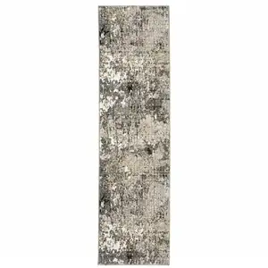 Photo of Grey Ivory Beige Charcoal Black Tan And Brown Abstract Power Loom Stain Resistant Runner Rug