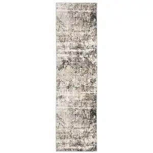 Photo of Grey Ivory Beige Charcoal Black Tan And Brown Abstract Power Loom Stain Resistant Runner Rug