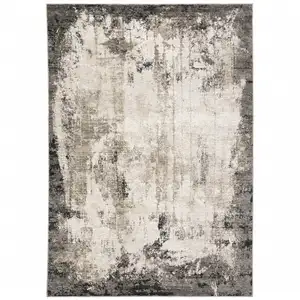 Photo of Grey Ivory Charcoal Tan Black And Beige Abstract Power Loom Stain Resistant Area Rug