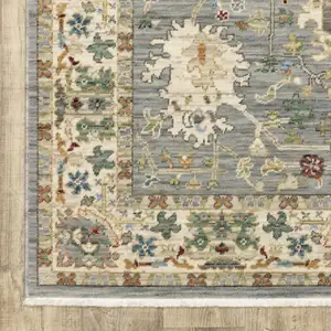 Photo of Grey Ivory Orange Teal Green Charcoal Blue And Red Oriental Power Loom Stain Resistant Runner Rug With Fringe