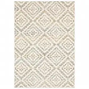 Photo of Grey Pink And Sage Geometric Power Loom Stain Resistant Area Rug