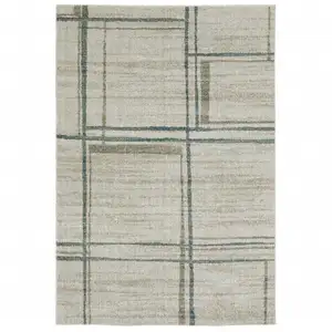 Photo of Grey Teal Beige And Tan Geometric Power Loom Area Rug