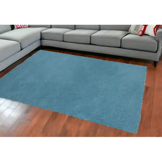 8'X11' Highlighter Blue Indoor Shag Rug Photo 1