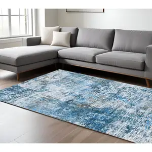 Photo of Ivory Abstract Distressed Area Rug