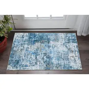 Photo of Ivory Abstract Distressed Area Rug