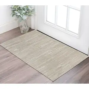 Photo of Ivory Abstract Hand Woven Worn Faded Area Rug