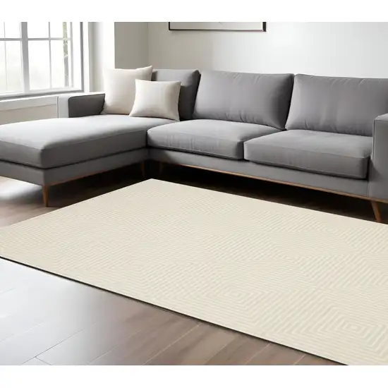 Ivory And Beige Geometric Area Rug Photo 1