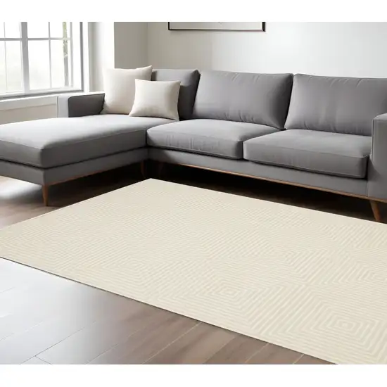 Ivory And Beige Geometric Area Rug Photo 1