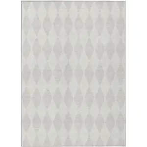 Photo of Ivory And Beige Geometric Washable Indoor Outdoor Area Rug