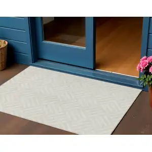 Photo of Ivory And Beige Geometric Washable Indoor Outdoor Area Rug