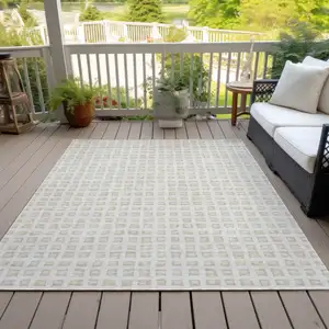 Photo of Ivory And Beige Geometric Washable Indoor Outdoor Area Rug