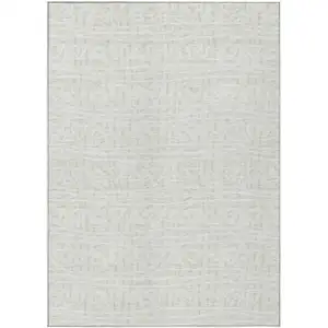 Photo of Ivory And Beige Geometric Washable Indoor Outdoor Area Rug