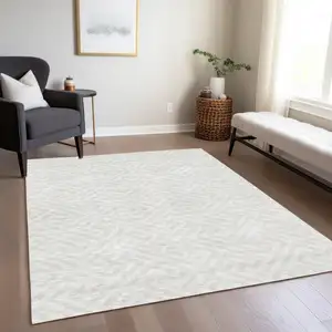 Photo of Ivory And Beige Geometric Washable Indoor Outdoor Area Rug