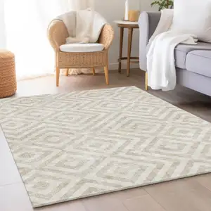 Photo of Ivory And Beige Geometric Washable Indoor Outdoor Area Rug