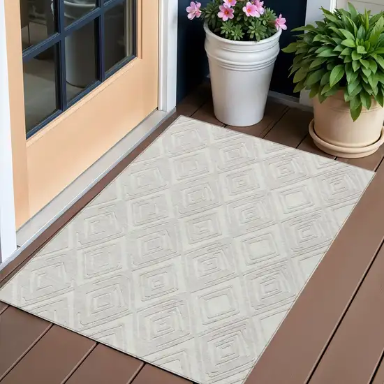 Ivory And Beige Geometric Washable Indoor Outdoor Area Rug Photo 1