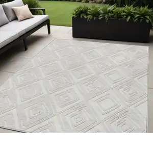 Photo of Ivory And Beige Geometric Washable Indoor Outdoor Area Rug