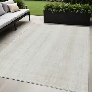 Photo of Ivory And Beige Striped Washable Indoor Outdoor Area Rug