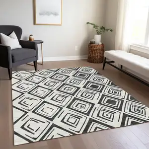 Photo of Ivory And Black Geometric Washable Indoor Outdoor Area Rug