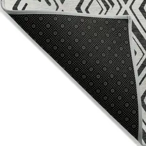 Photo of Ivory And Black Geometric Washable Indoor Outdoor Area Rug