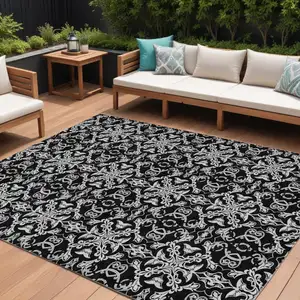 Photo of Ivory And Black Medallion Washable Indoor Outdoor Area Rug