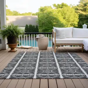 Photo of Ivory And Black Medallion Washable Indoor Outdoor Area Rug