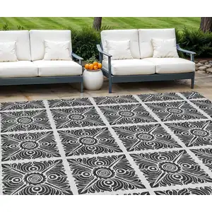 Photo of Ivory And Black Medallion Washable Indoor Outdoor Area Rug