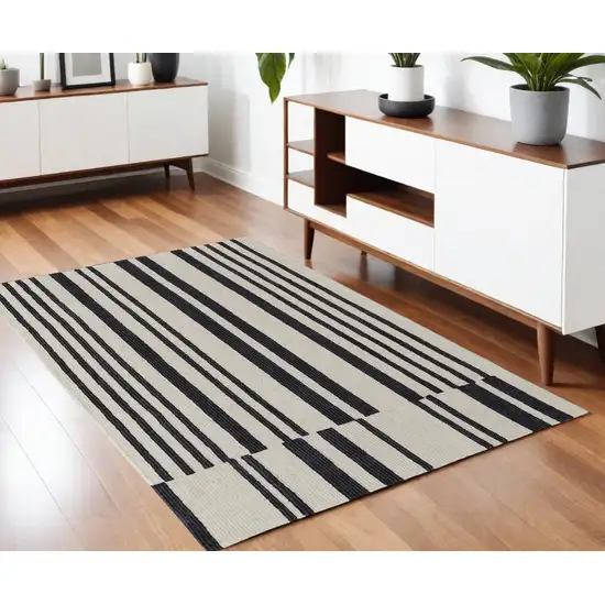 Ivory and Black Wool Abstract Hand Tufted Area Rug Photo 1