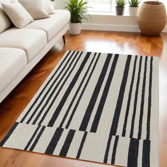 Ivory and Black Wool Abstract Hand Tufted Area Rug Photo 1