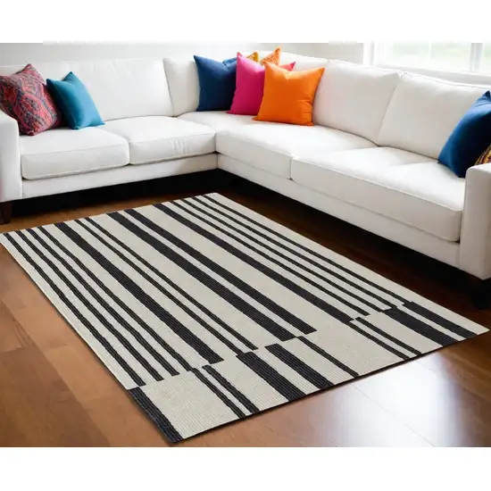 Ivory and Black Wool Abstract Hand Tufted Area Rug Photo 1