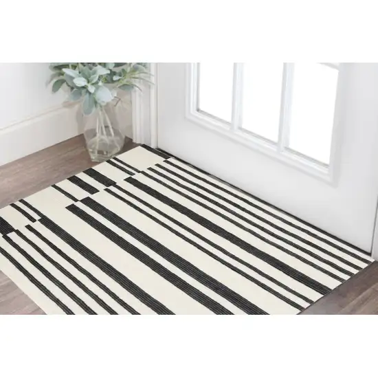 Ivory and Black Wool Abstract Hand Tufted Area Rug Photo 1