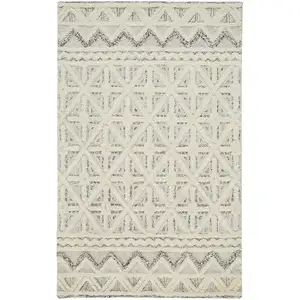 Photo of Ivory And Black Wool Geometric Tufted Handmade Stain Resistant Area Rug