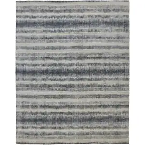 Photo of Ivory And Blue Abstract Hand Woven Area Rug