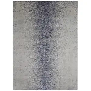 Photo of Ivory And Blue Abstract Power Loom Area Rug