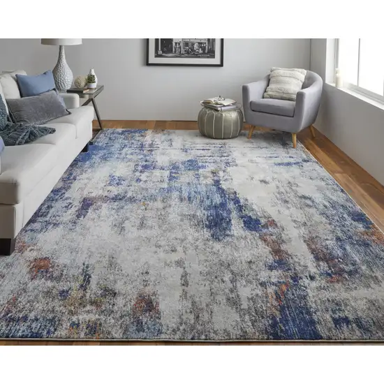 Ivory And Blue Abstract Power Loom Distressed Stain Resistant Area Rug Photo 1