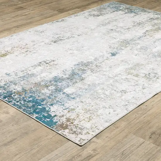 Ivory And Blue Abstract Printed Stain Resistant Non Skid Area Rug Photo 6