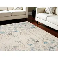 Photo of Ivory And Blue Floral Area Rug